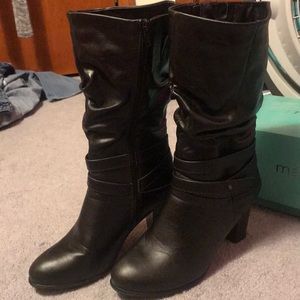 Worn once heeled boot